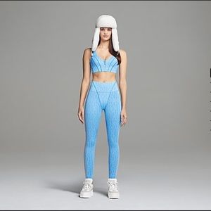 Ivy Park light monogrammed mesh tights